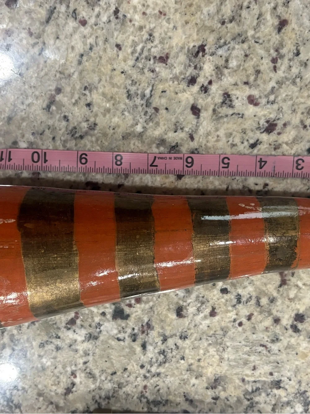 Orange and gold striped vase unbranded with crazing issues